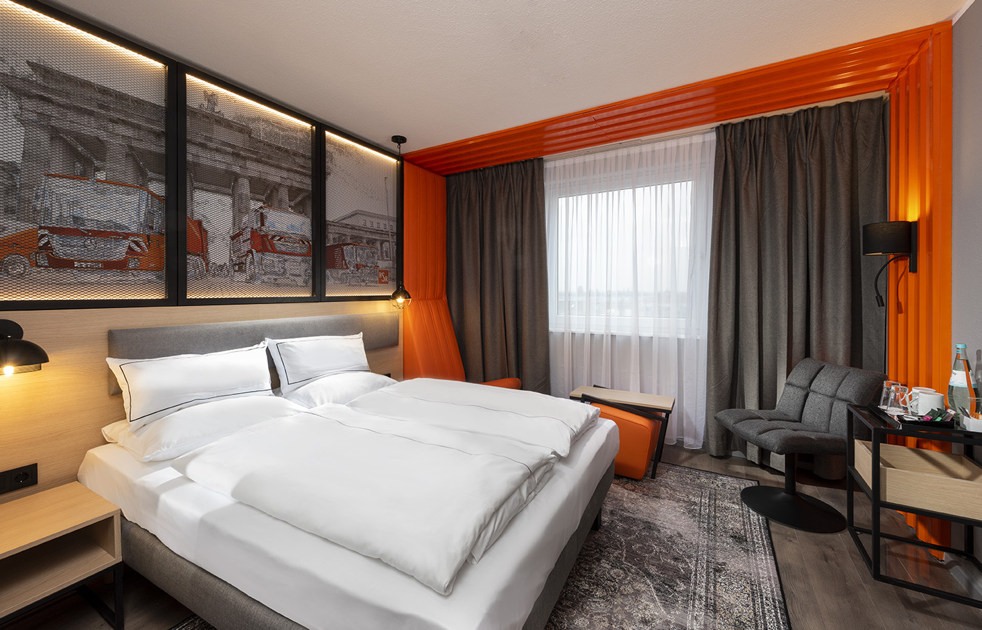 ibis Styles Berlin Treptow – Zimmer mit Sitzbereich